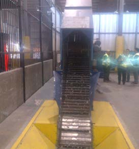 intake conveyor to the shredder